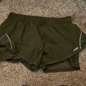Green athletic shorts Size: M